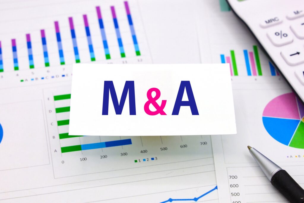 企業を買収している経営者